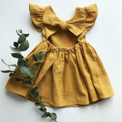 China Summer Fashion Breathable Girls Dress Organic Ruffle Canvas Sleeve Cotton Fabric Baby Kids Float Dress for sale