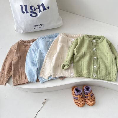 China Latest Style Breathable Spring Autumn Children Wear Solid Color Knitted Soft Long Sleeve Button Baby Cardigan Sweater for sale