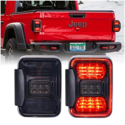 China Current Reverse Turn Brake (Reverse: White. Turn: Yellow. Brake: ) Loyo 2022 Red Newest Design Led Taillights Aluminum Housing USA Style Car Led Tail Light 30W Truck Tail Switch For Jeep Tj Tj for sale