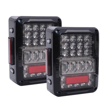 China Reverse turn brake current (reverse: White. Turn: Yellow. Brake: ) Lighting system red auto tail light plug and play led tail lamp drl yellow red brake led tail light tail light for jeep cowboy JK for sale