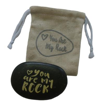 China Europe Natural Pebble Stone With Customized Printing Words And Designs Black Pebbles Polishing Stone for sale