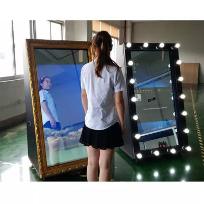 China Round 100 Hot Waterproof 19.5inch Mirror Smart Touch Led Display Mirror Magic Photo Booth Selfie Transparent Mirror With Camera Led Light Circle for sale