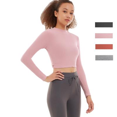 China Breathable Woman Activewear Tops Sporty Sports Gym Shirt Cross Back Backless Sweated Ladies Wicking Long Sleeve Yoga Ribbed Top for sale