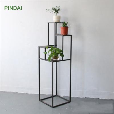 China Workable Wrought Iron Flower Stand Black Metal Ladder Floor Shelf Rack for sale