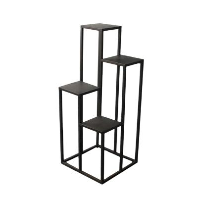 China Modern Black Metal Flower Floor Stand Plant Shelf Stainless Corner Garden Shelf for sale