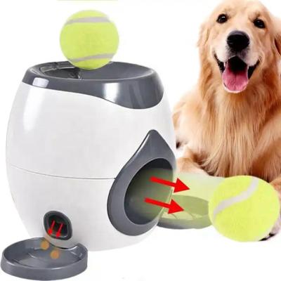 China Sustainable Pet Dog Fetch And Treat Machine Thrower Interactive Launcher Slow Feeder Toy Automatic Pet Feeder for sale