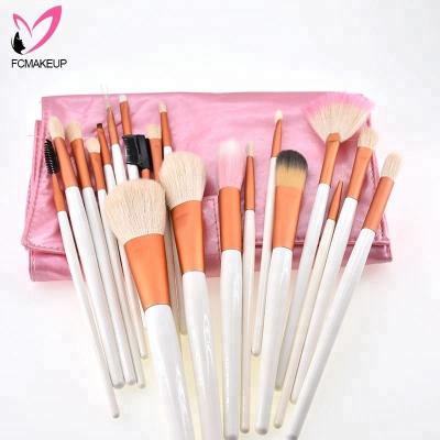 China Angular Blush Pink and White Cutout Rose Gold Ferrule Best Natural Goat Hair Makeup Brush Set 20pcs Blush Large Oval Make Up Tool Kit for sale