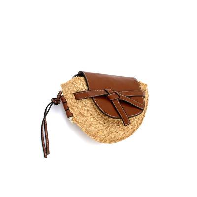 China Sweet Style Fashion Women Summer Handwoven Sling Shoulder Bag Straw Beach Natural Woven Cross - Body Bag for sale