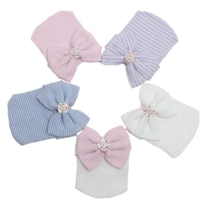 China Hospital Striped Newborn Baby Hat Infant Hat With Big Bow And Crystal Soft Cute Knot Nursery Cap for sale