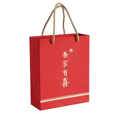 China paper & Custom Cardboard Classic Red Wedding Tissue Gift Bags Packaging Orange Paper Bag With Rope Handle for sale