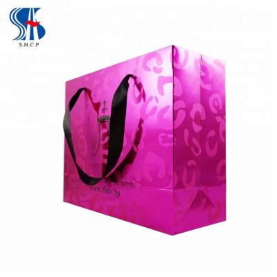 China Recyclable Purple Custom Design Printed Luxury Paper Gift Shopping Bag for sale