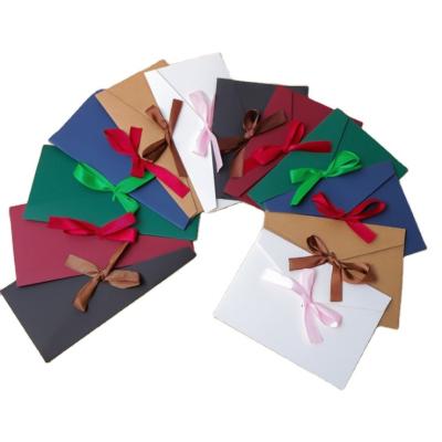 China Recycled Materials Fashion Color Custom Gift Card Wrapping Paper Wrap With Ribbon for sale