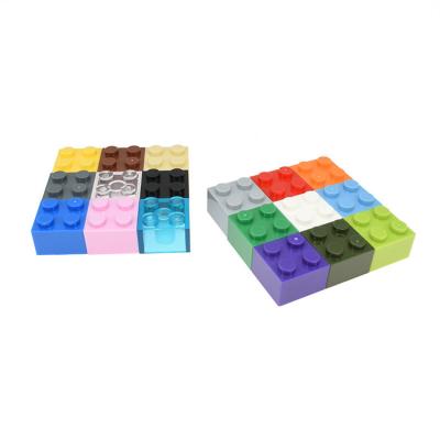 China DIY TOY Wholesale Plastic Legoing Accessories Qcql1-20 2*2 Parts Puzzle Building Block High Foot Base Brick Toy For Children for sale