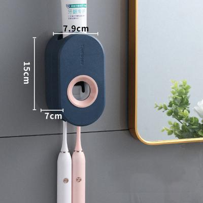 China Sustainable Bathroom Wall Mount Hands Free Squeezer Automatic Toothpaste Dispenser for sale