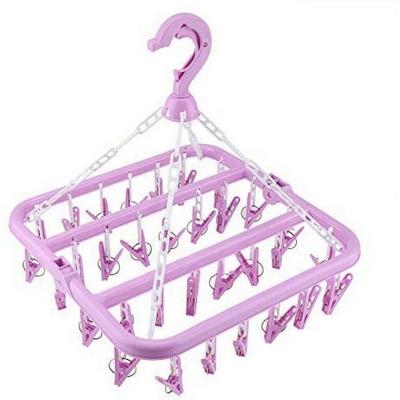 China 32 Viable Clips Drying Rack Folding Hanger Plastic Dryer Socks Underwear Rack Windproof Rack For Home for sale