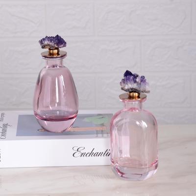 China Modern Minimalist Small Decorations For Office Small Decorative Glass Bottles With Stone Lid Natural Crystal 2021 Home Decor for sale