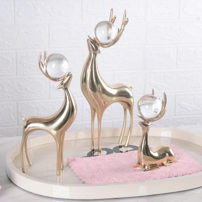 China Contemporary WORKS FOR BRASS STATUE HOME ACCENTS STATUE CHRISTMAS DEER CHRISTMAS DEER INTERIOR ANIMAL DECOR for sale