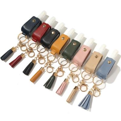 China Fashionable Leather Tassel Spray Case Key Ring Amazon Perfume Spray Bottle Empty Leather Tassel Key Chain for sale