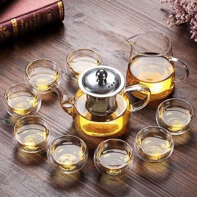 China Viable Transparent Glass Household Kungfu Teacup Set Porcelain Coffee Cup And Saucer Heat Resistant Tea Set for sale