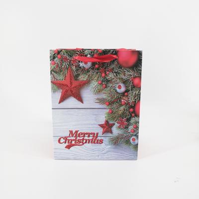 China Recyclable Popular Custom Printed Christmas Card Packaging Paper Bag For Gift for sale