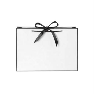 China Custom White Luxury Printed Biodegradable Gift Manufacturer China Shopping Paper Bag With Your Own Logo for sale