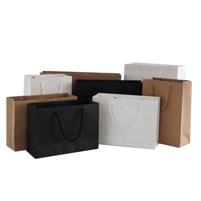 China Recyclable Personalized Logo Printing Cardboard Bag Shopping Paper Gift Bags With Rope Handle for sale