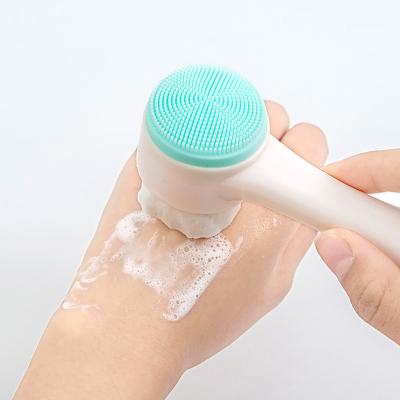 China 2022 New Long Handle Double Side Silicone Face Massager Portable Home Beauty Manual Touch Facial Cleansing Brush for sale