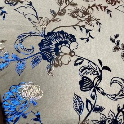 China OEM ODM Waterproof Foil Printed Spunlace Nonwoven Fabric Gold Hot Stamping for sale