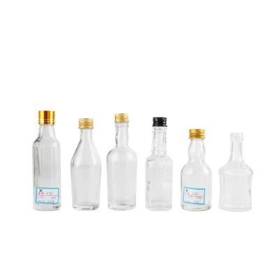 China Wholesale Custom Mini Glass Wine Bottles Clear Empty Wine Glass Bottle For Liquor for sale