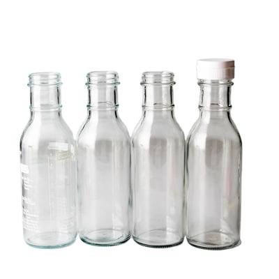 China 375ml Beverage Beverage Bottle Empty Clear Glass Milk Beverage Bottle With Plastic Lid for sale