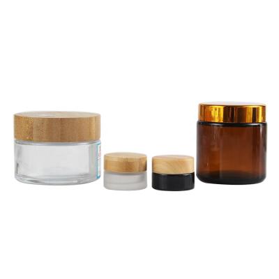 China Cosmetic All Size Frosted Glass Cream Jars Glass Jar With Bamboo Cap for sale