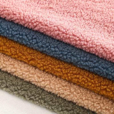 China Fleece sherpa fabric Free Sample Winter Season Plain Warm Comfortable 100% Polyester Knitted Fleece Sherpa Fabric for sale