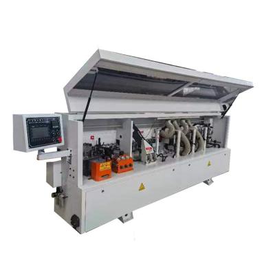 China Hotels Easy to Operate 19.6kw Motor power Automatic board Edge Banding Machine for sale