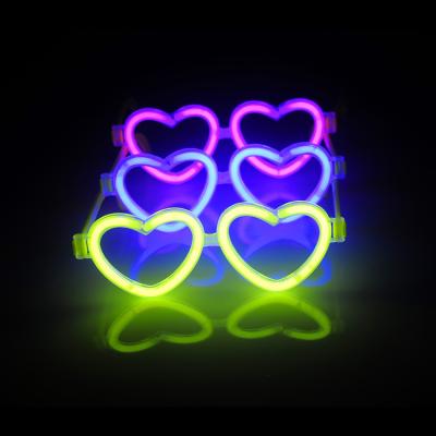 China Fun Trendy Kids Favor One Time Use Heart Shape To Glow Stick Goggles For Party for sale