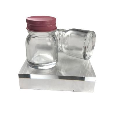 China Recyclable High Quality Round Glass Jar Food Storage Jar Honey Bee Hot Sauce Round Glass Jars for sale