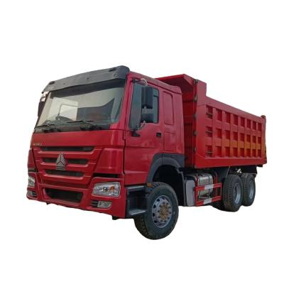 China RHD used China sinotruck trucks 371hp Euro2 Howo dump tipper trucks price for sale