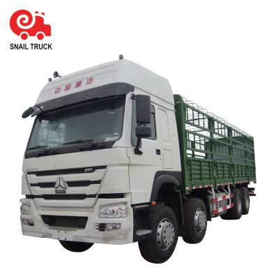 Chine Manual Used Fence Stake Cargo Truck Sinotruk Howo 8x4 Truck For Animal Delivery à vendre