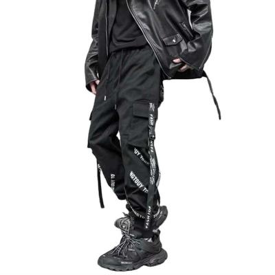 China Anti-wrinkle street fashion sports cargo pants men's loose functional tactical pants custom for sale