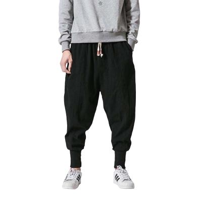 China 2021 Anti-wrinkle chinese style cotton harem cargo pants for men solid color elastic waist streetwear sweat casual pants for sale