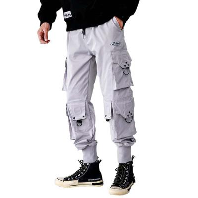 China Korean Anti-wrinkle spot trend multi-pocket cargo pants men's loose feet pants wholesale for sale