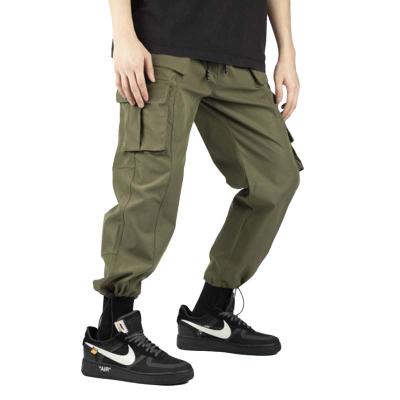 China Anti-wrinkle men's trend sports casual pants autumn multi-pocket cargo pants outdoor fitness pants manufacturers wholesale for sale