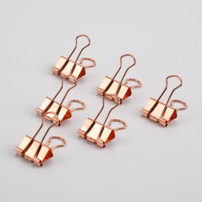 China Beautiful Design Mini Size Fancy Mounted Gold Stainless Steel Fold Binder Clips for sale