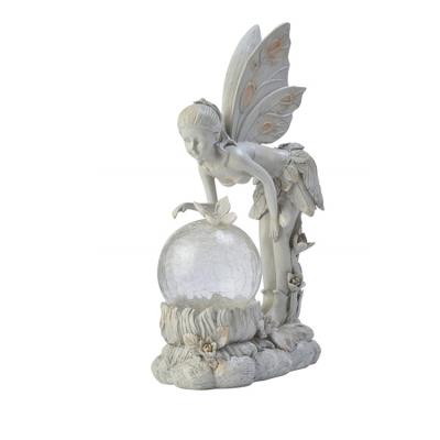 China Europe Solar Garden Polyresin Figurine LED Light Standing Colour-Changing Sprite With Globe for sale