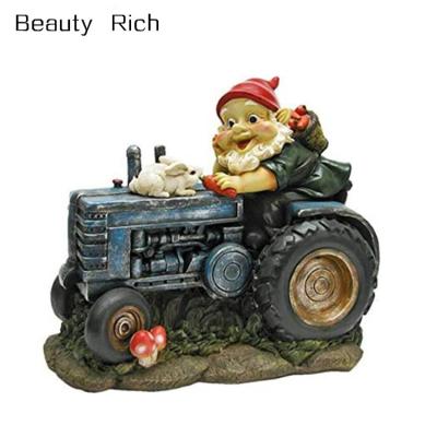 China Africa Polyresin/Resin Garden Gnome Statue - Rabbit Aboard Garden Gnome Tractor - Lawn Gnome for sale