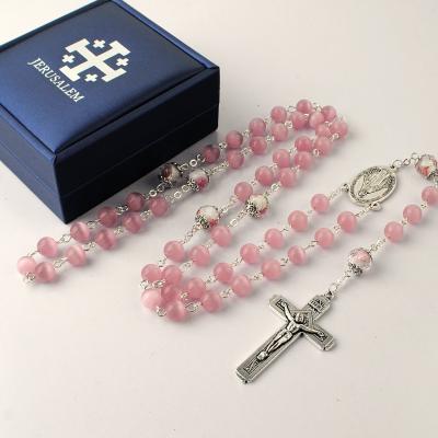 China Pink 8mm Religious Glass Cat Eyes With Azure Stone Our Father Beads Catholic Rosary Necklace With Leather Gift Box For Girls for sale