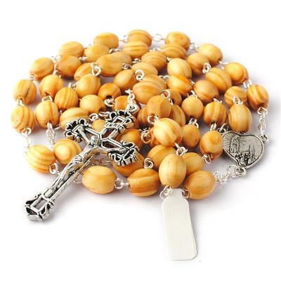 China Religious Pine Wood Beads Rosary with Our Lady of Fatima Center Piece Necklace with Religious Crucifix Pendant for sale