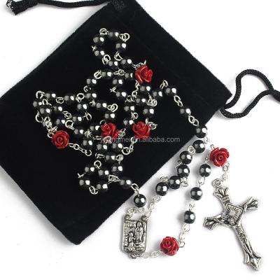 China 6mm Religious Hematite Round Beads With 8mm Coral Rose Beads Catholic Rosary With Velvet Bag for sale