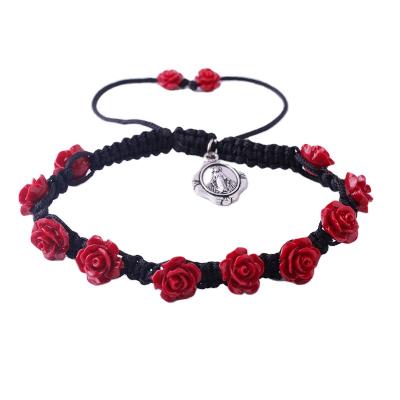 China Religious Handmade Virgin Mary Pendant Catholic Red Rose Beads Adjustable Rosary Bracelet On Black Cord for sale