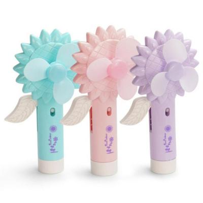 China Portable Mini Fan Sunflower Hand Pressure Water Spray Small Fan For Kids Children for sale