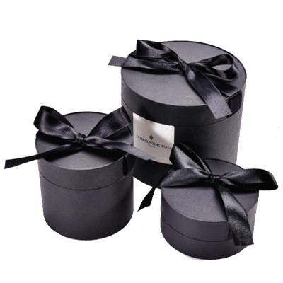 China Luxury Recycled Materials Round Black Cardboard Gift Box With Ribbon Cylinder Cardboard Flower Packaging for sale